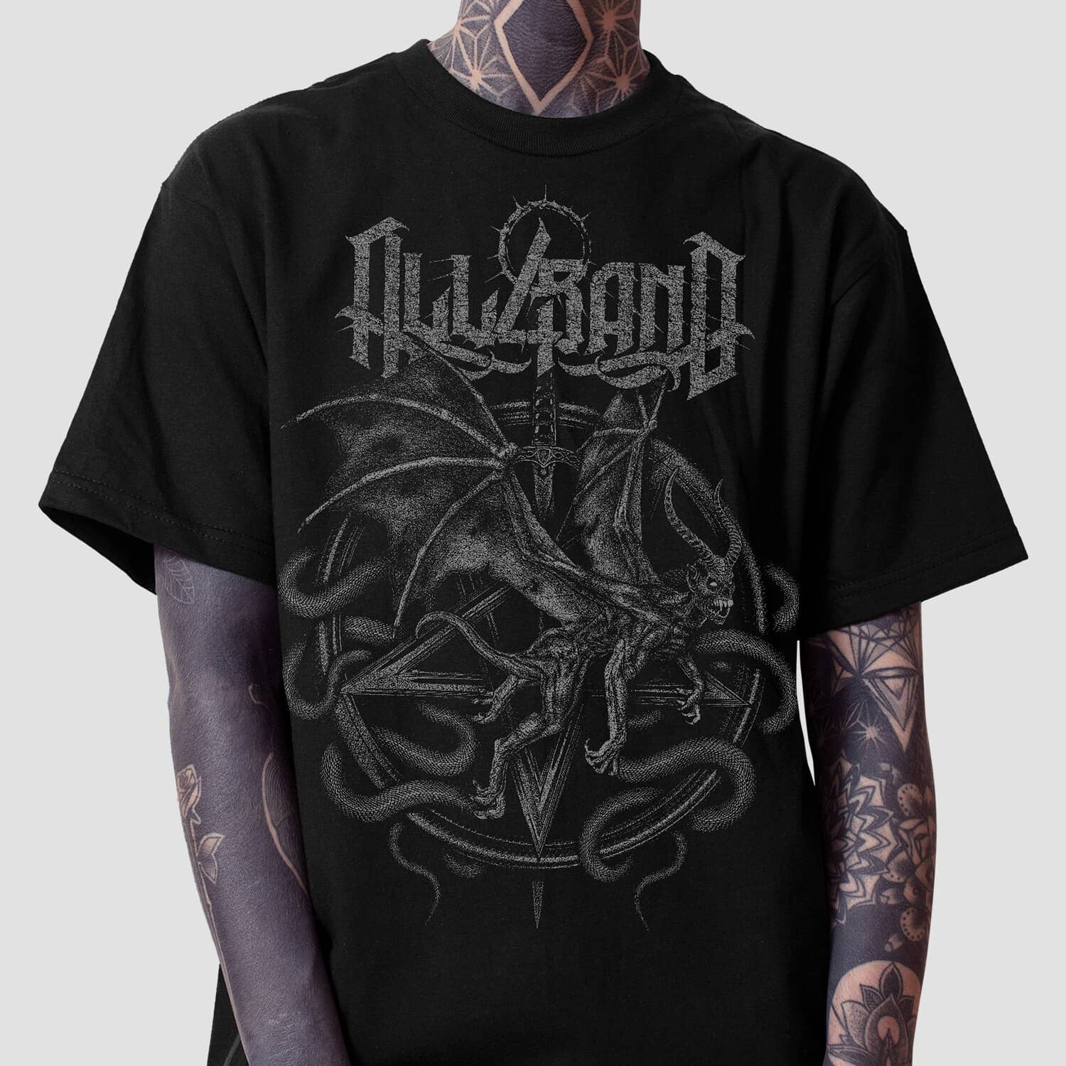 Death metal shirt design featuring a winged demon over a pentagram and coiled serpents