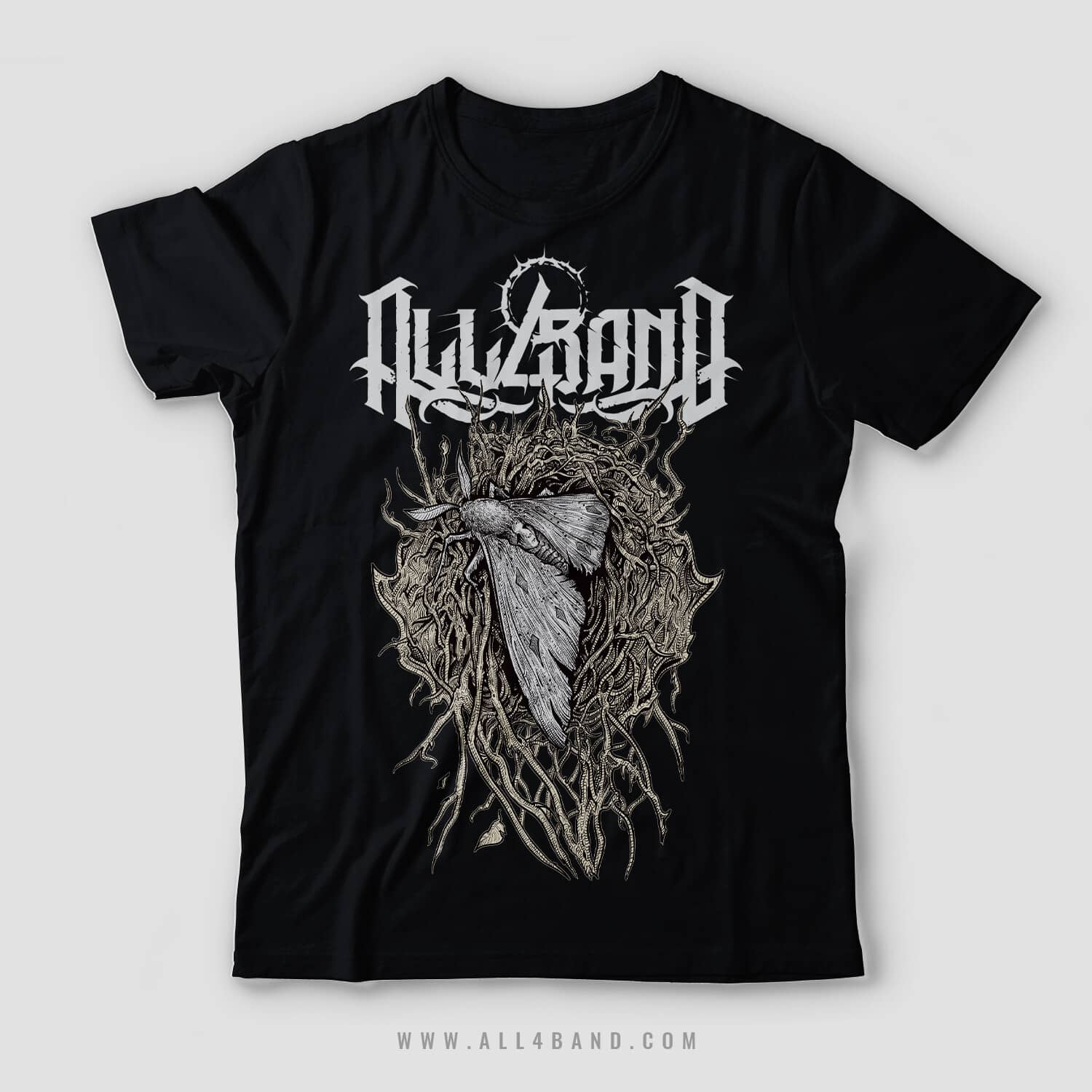 Band shirt design featuring a large moth with a face-like pattern on its back, surrounded by tangled roots and thorns